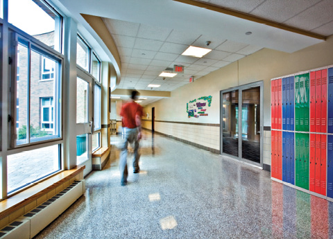 fire-rated glass door system installed in school hallway