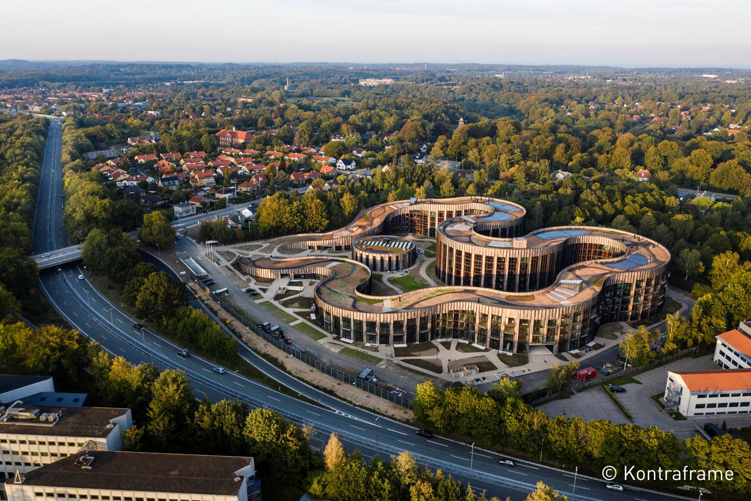 aerial view of residential project with many S curves enclosing a courtyard