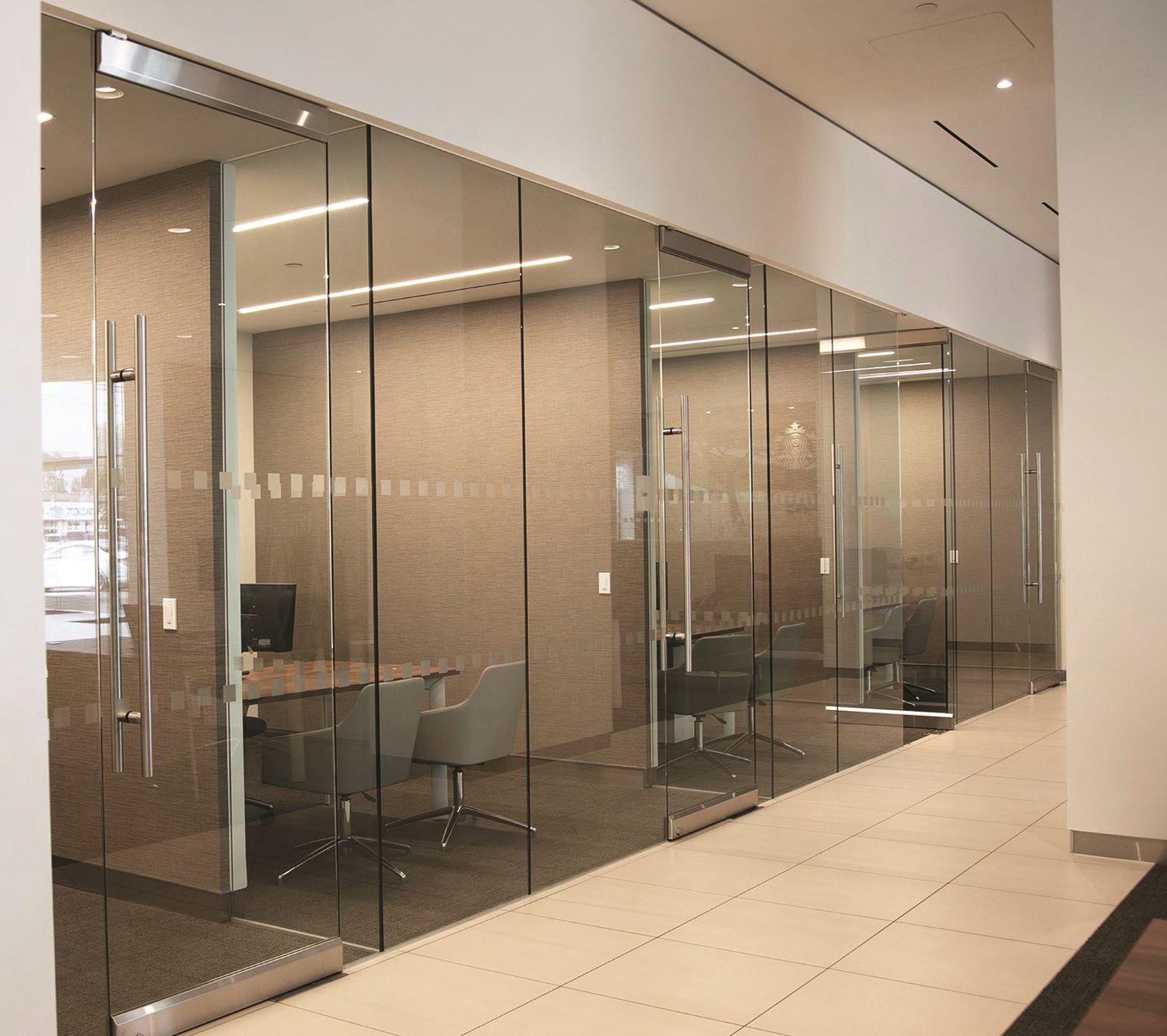 frameless rail system for glass doors