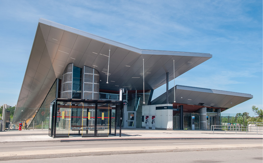 Ottawa LRT stations with overhanging metal rainscreens