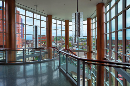 View to outside through glass railings and curtainwall with jumbo glass