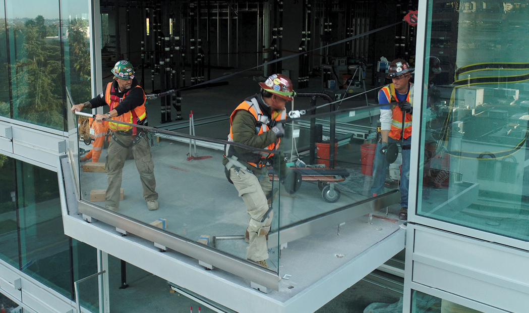 glaziers install glass railing 