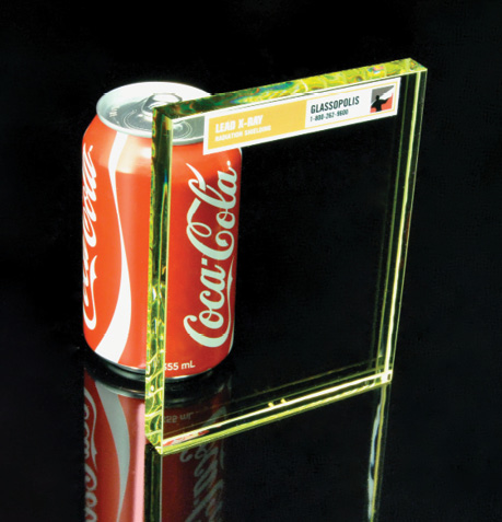 clear protective glazing with visible soda can on other side of sample