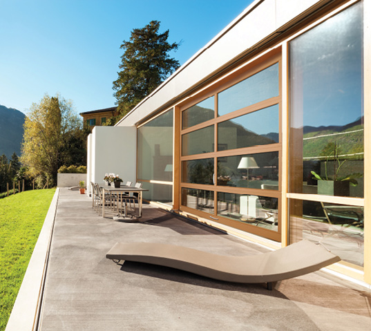 patio with glass entrance in natural setting