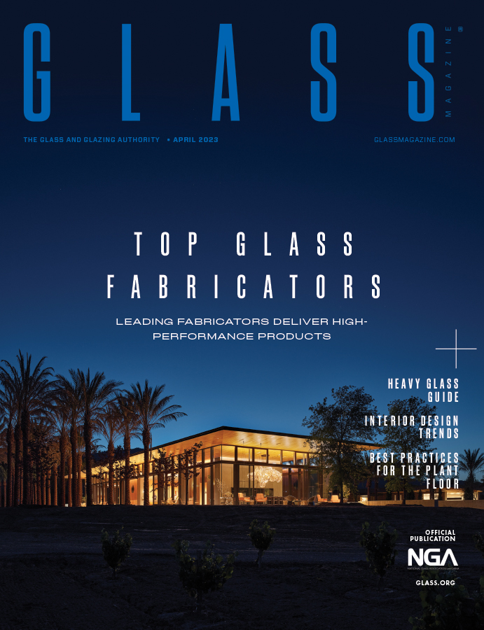 nighttime photo by Matthew Millman of the Caymus Winery’s new Visitor Experience Centre on the cover of the annual top fabricators issue of Glass Magazine