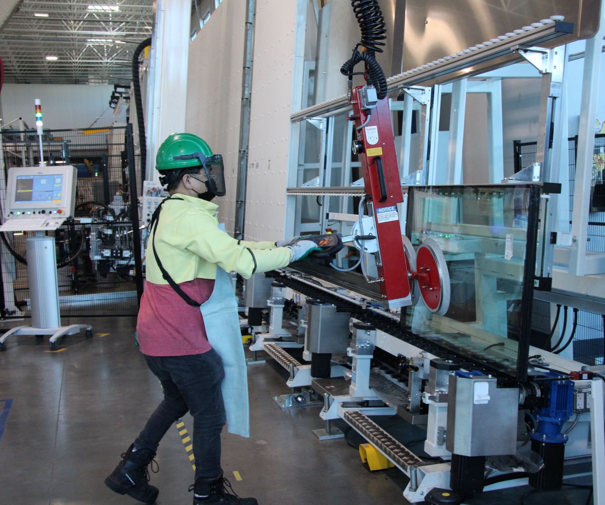 fabricator operating machinery