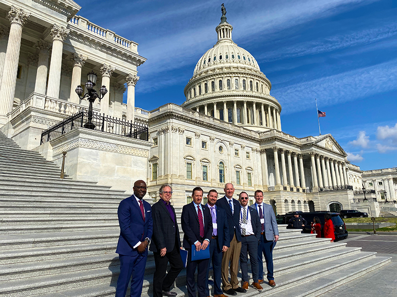 Participants at Glass and Glazing Advocacy Days in front of the U.S. Capitol building