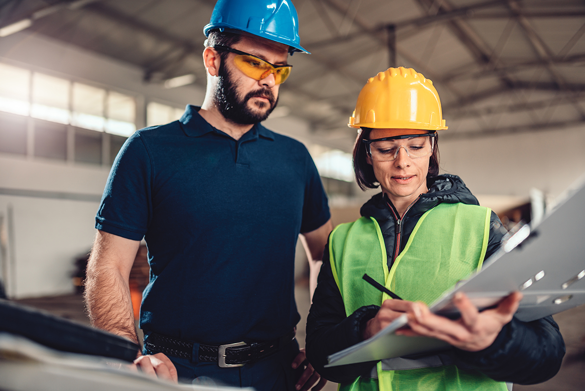 Woman and man construction workers