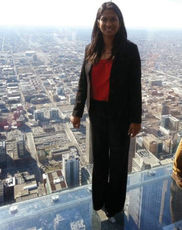 NGA technical director standing on all glass ledge of Willis Tower