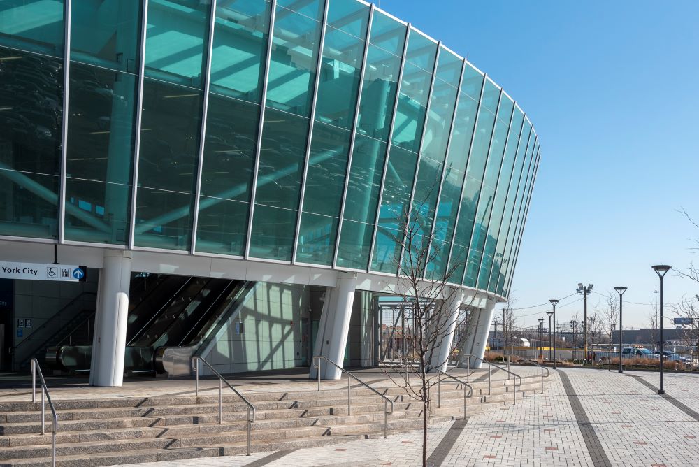 train station with glass and metal facade
