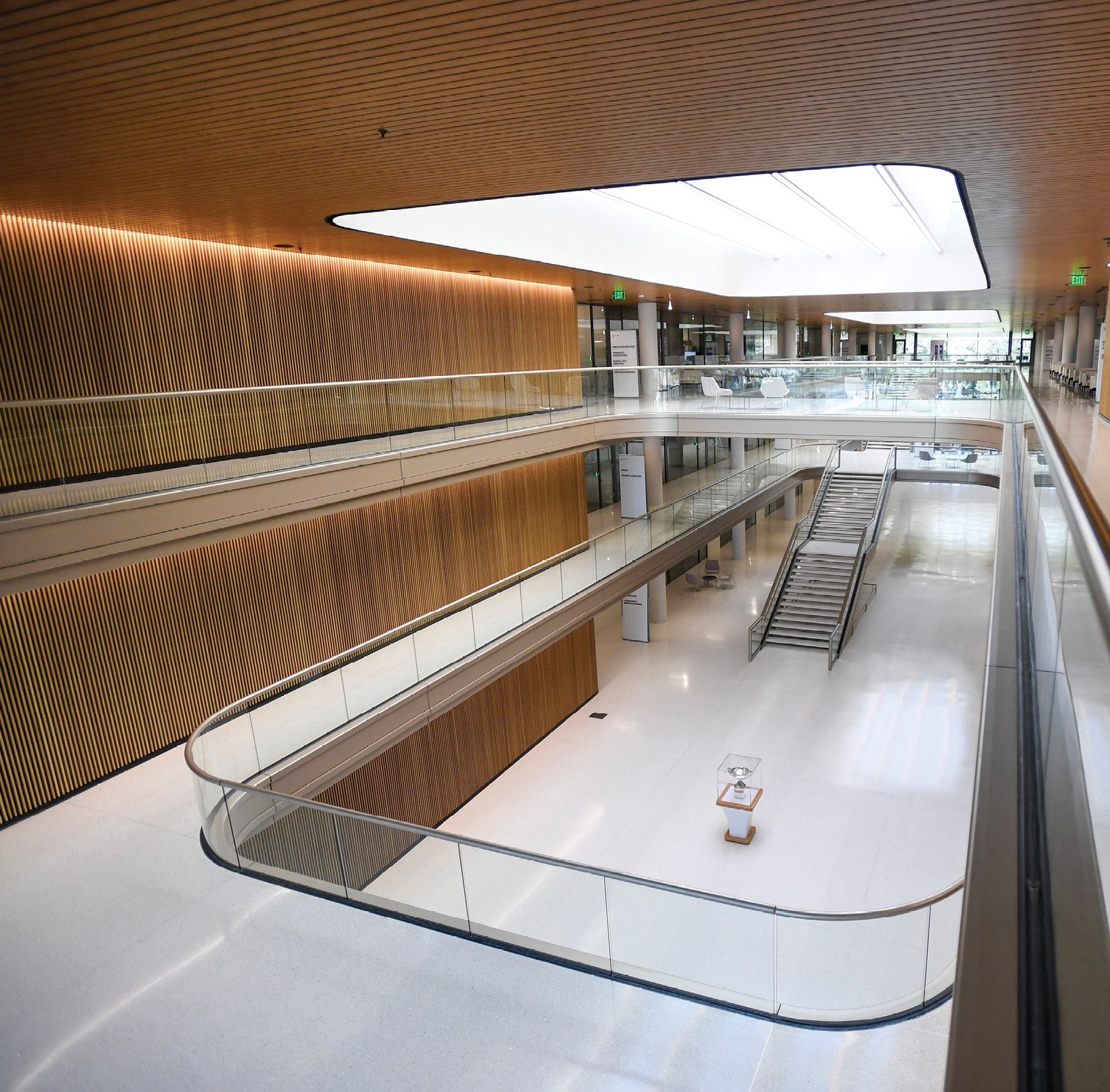 interior stairways with straight and curved glass railing