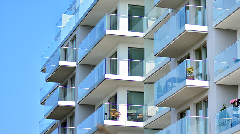 Building with glass railings.