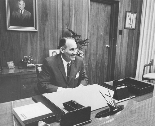 Binswanger president, Mickey, in 1963, at his desk