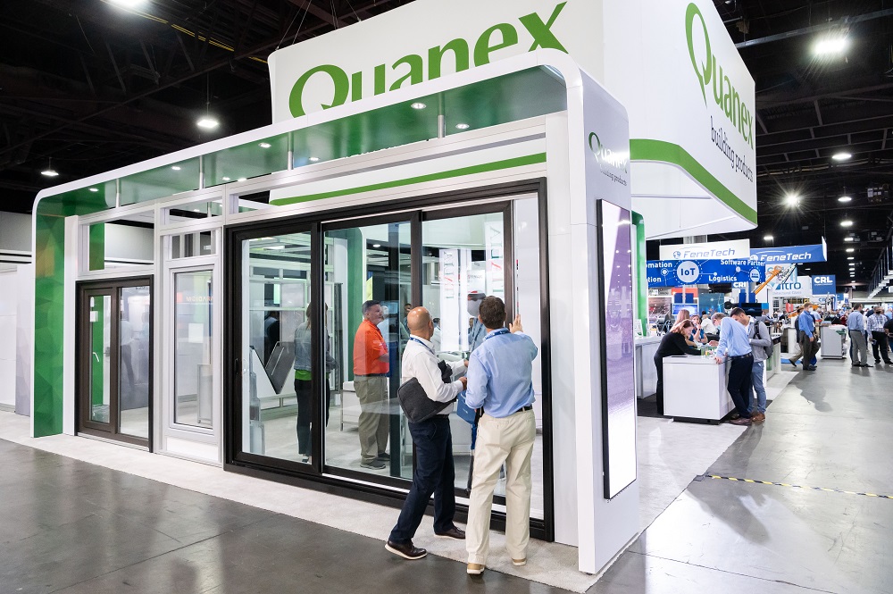 Attendees visit the Quanex booth during GlassBuild America 2021 in Atlanta. 