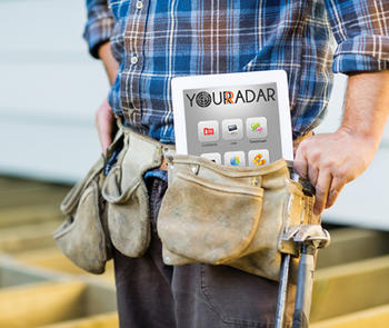 worker with tablet in toolbelt