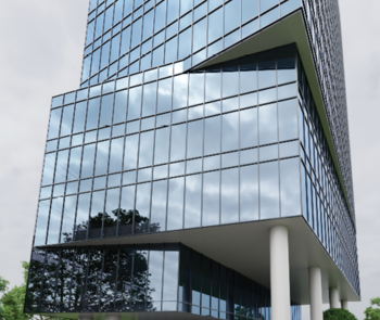 glass building reflecting trees and clouds