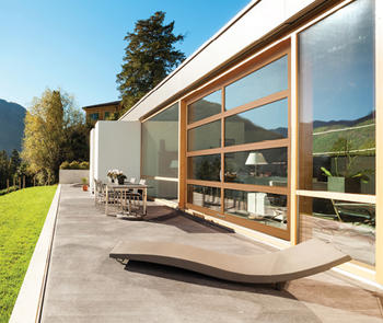 patio with glass entrance in natural setting