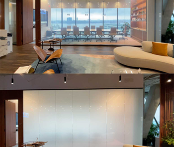 two views of a glass wall in a conference room, one clear glass and the second opaque after electricity is applied